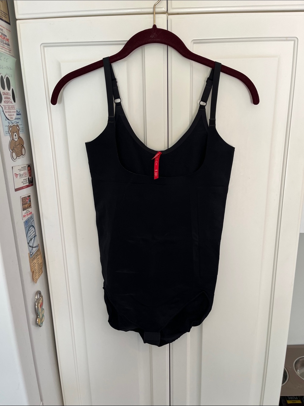 Spanx Black Body Suit
Size Large 
Black